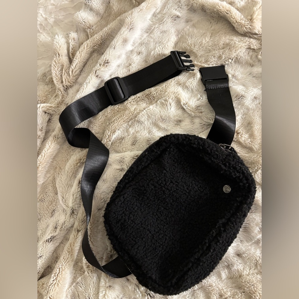 Plush Black Sherpa Cross Body Bag w Adjustable Satin Strap & Utility Buckle.